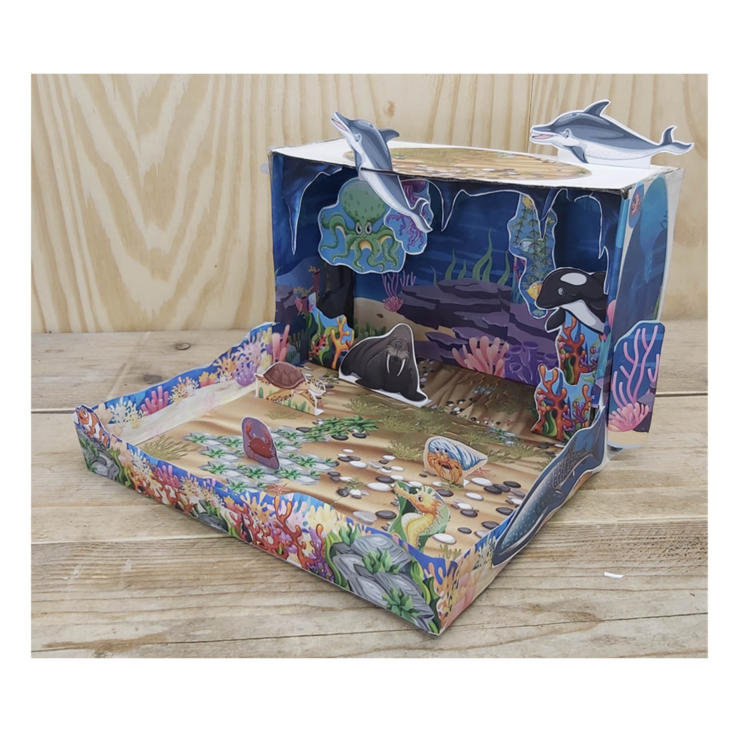 Left side view of a printable Ocean Habitat shoebox diorama with fish and coral