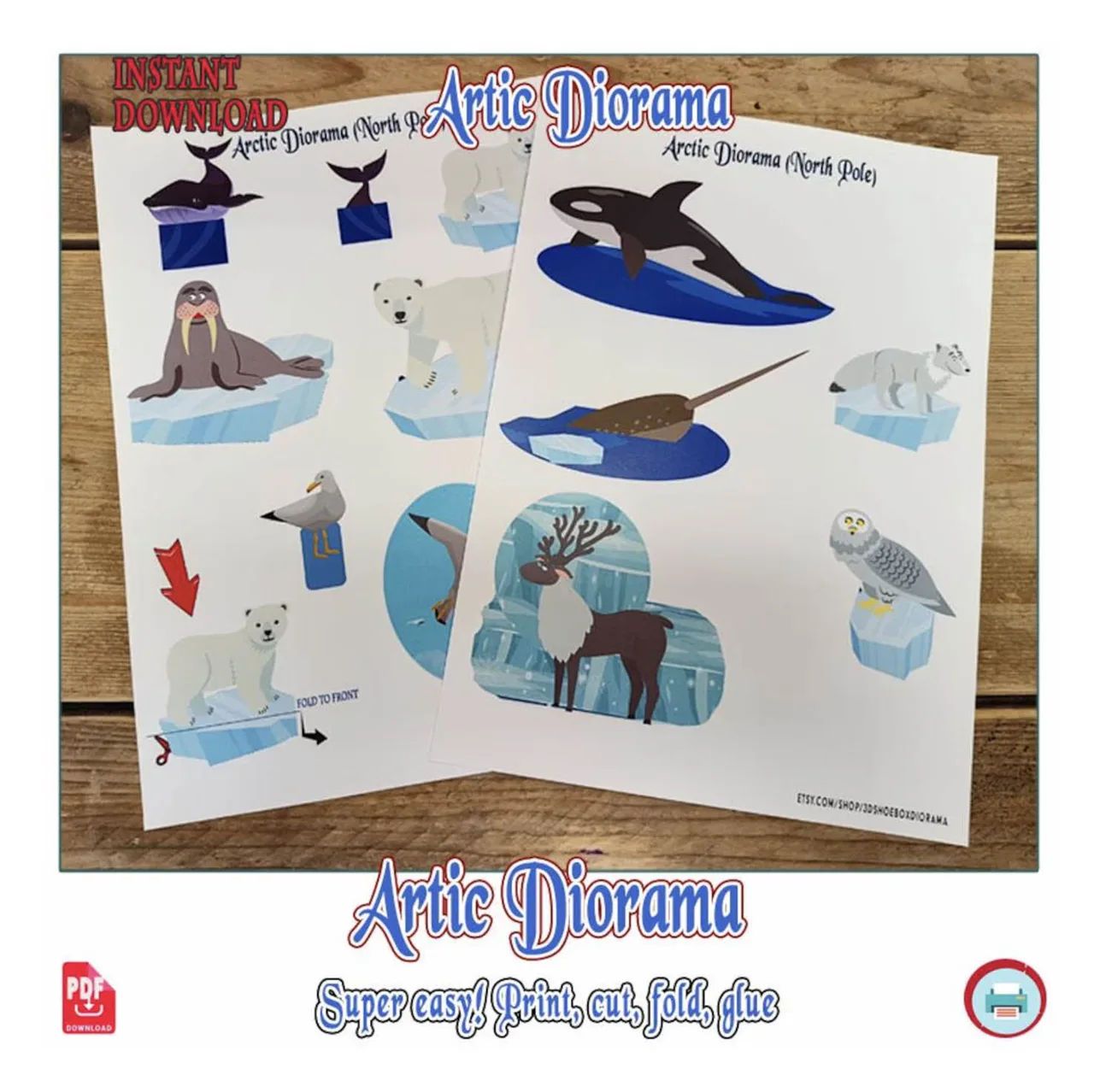 Close-up of printed Arctic animal pages from the printable shoebox diorama PDF