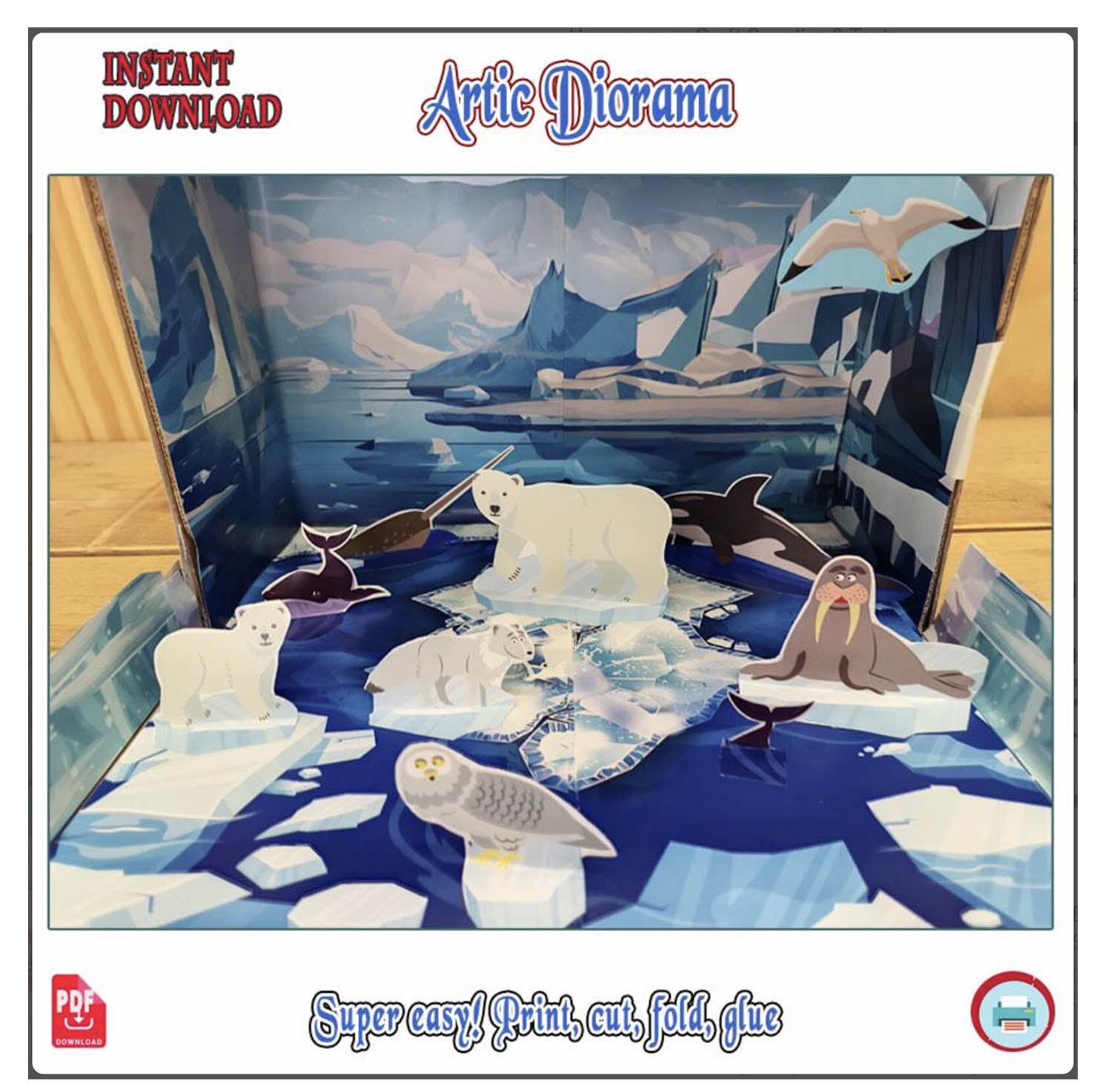 Close-up of the completed Arctic Habitat shoebox diorama with layered snow and animals
