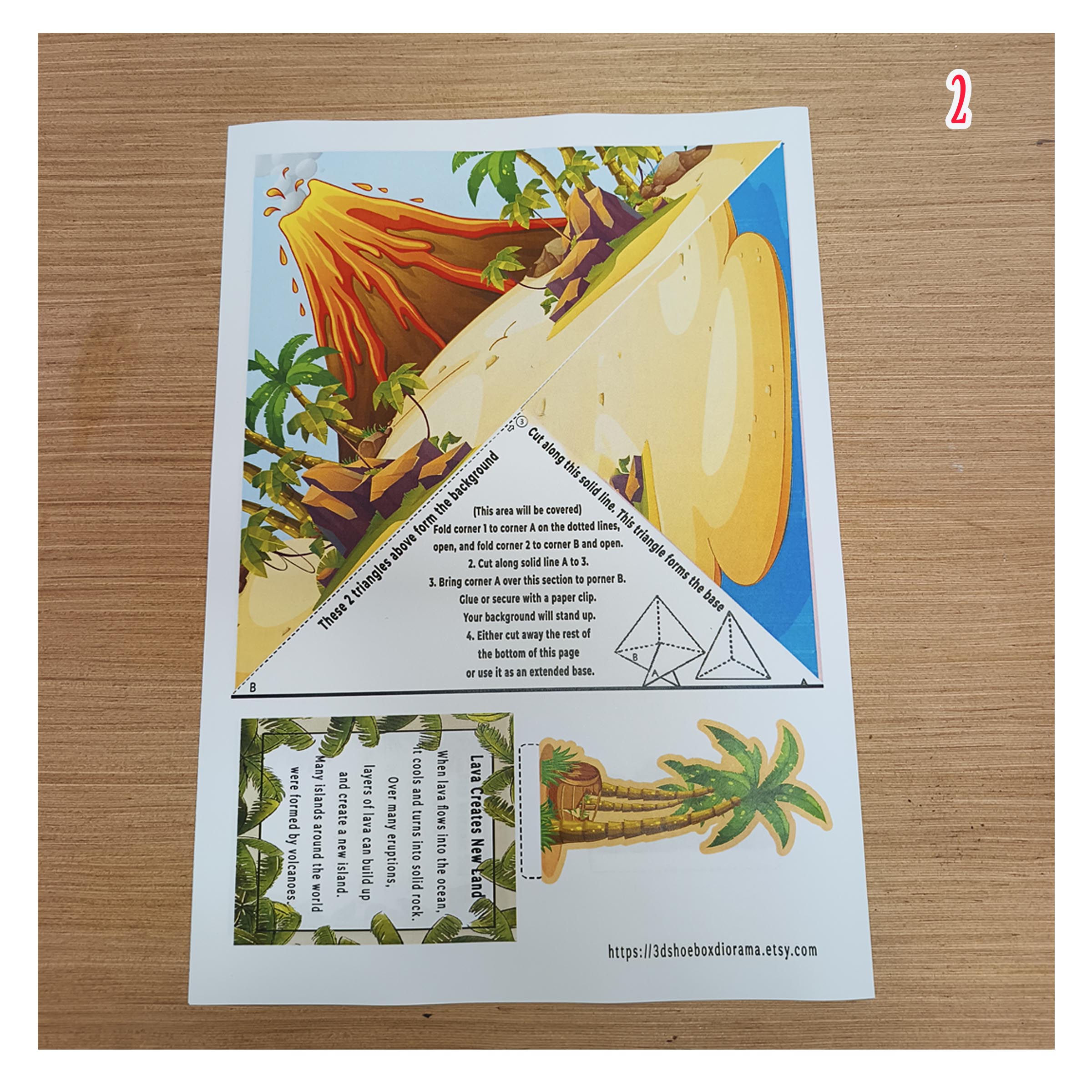 Printable island formation scene with a volcano, palm tree cut-out and a card about lava creating new land